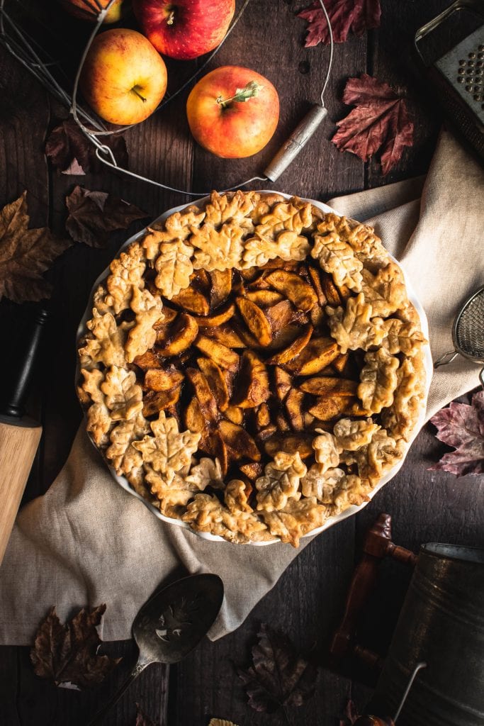 a whole German Apple Pie topped with pie crust leaf cut-outs