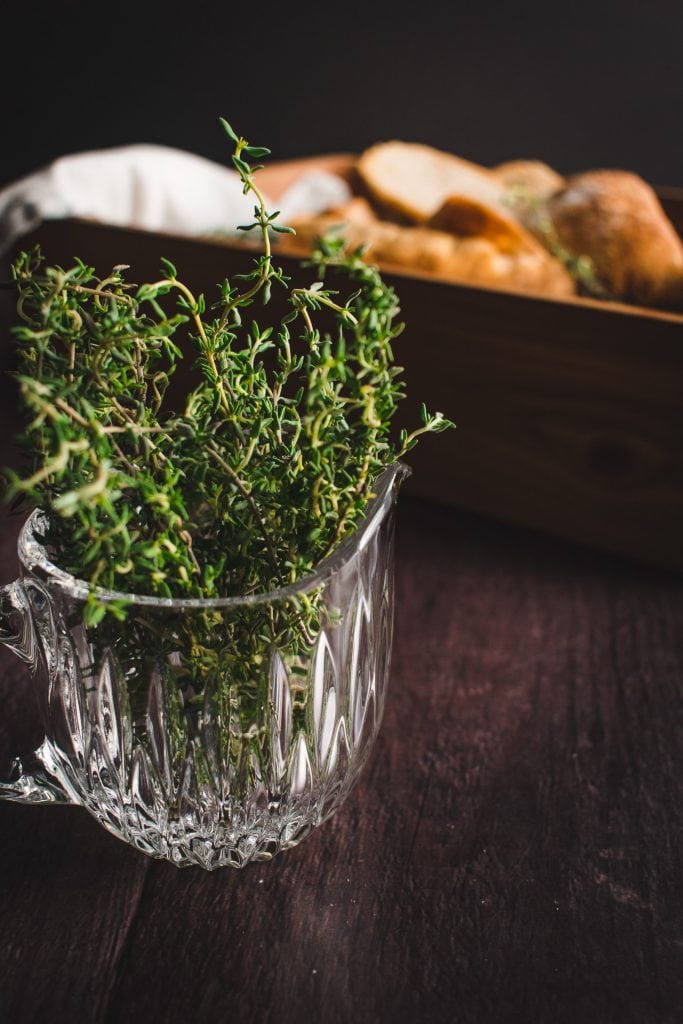 fresh thyme sprigs in a glass