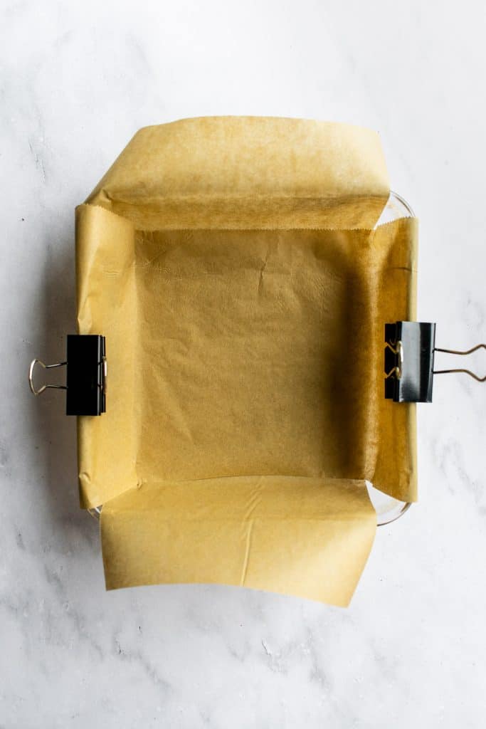 A baking pan lined with parchment paper.