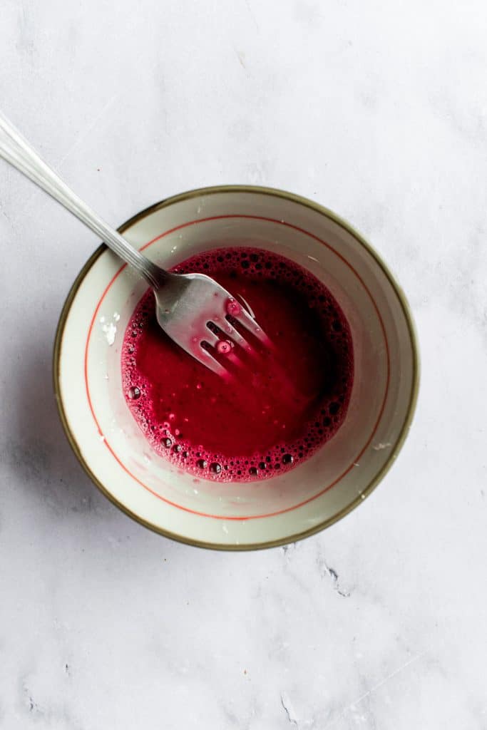 Cherry sauce and cornstarch in a small bowl.