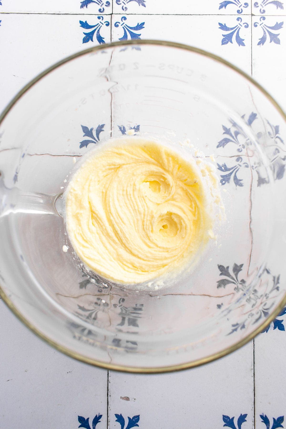 Beaten butter and sugar in a mixing bowl. 
